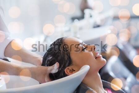 Feliz mulher jovem salão de cabeleireiro beleza cuidados com os cabelos pessoas Foto stock © dolgachov