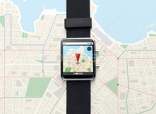 close up of smart watch with gps navigator map Stock photo © dolgachov