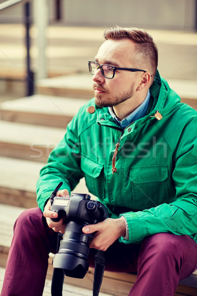 Jeunes homme appareil photo numérique ville personnes [[stock_photo]] © dolgachov