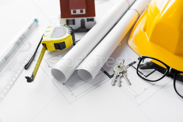 close up of blueprint with tools and house keys Stock photo © dolgachov