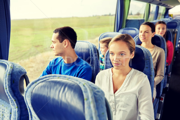 group of passengers or tourists in travel bus Stock photo © dolgachov