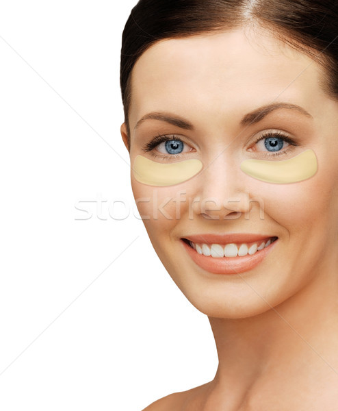 Stock photo: close up of woman face with under-eye patches