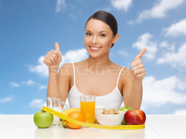 woman with fruits and vegetables showing thumbs up Stock photo © dolgachov