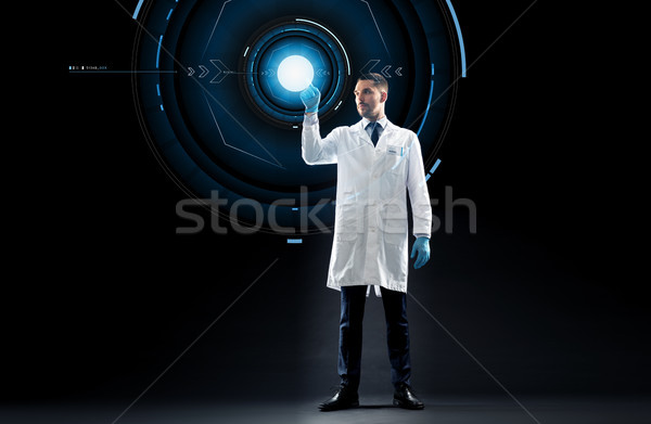 doctor or scientist with virtual projection Stock photo © dolgachov