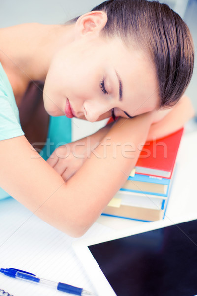 Fáradt diák alszik stock könyvek kép Stock fotó © dolgachov