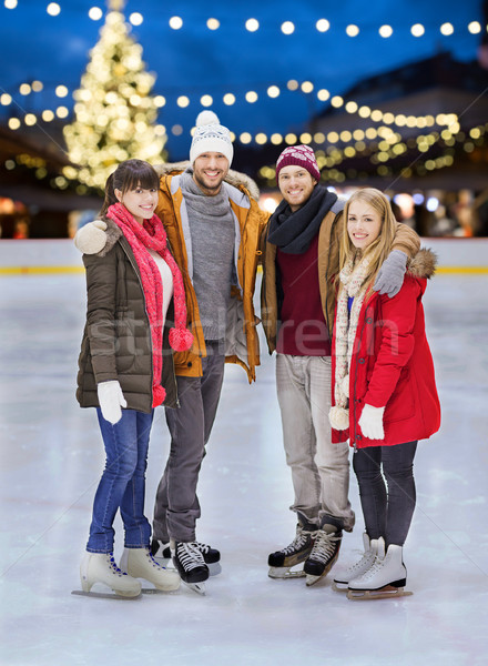 Boldog barátok karácsony korcsolyázás pálya tél Stock fotó © dolgachov