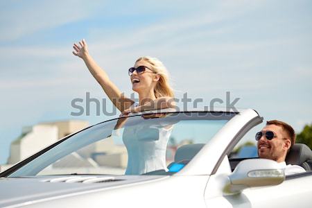 happy hippie woman showing peace in minivan car Stock photo © dolgachov