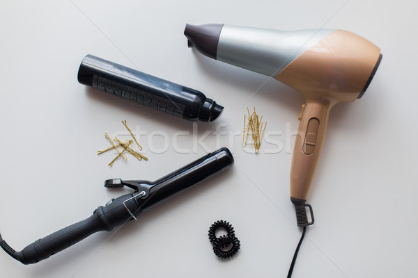 hairdryer, styler or curling iron and hair spray Stock photo © dolgachov