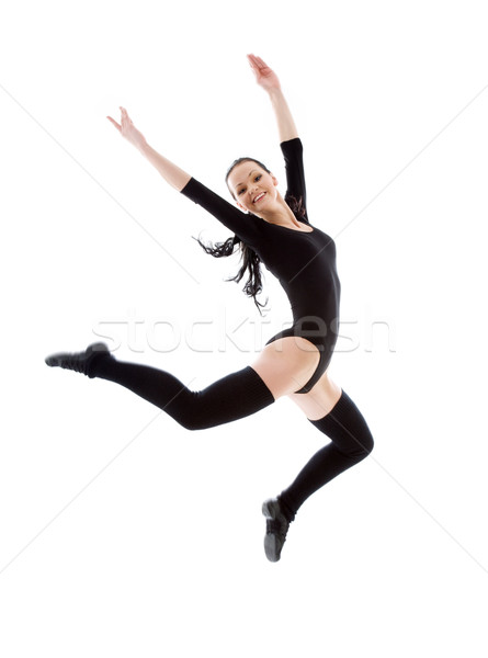 jumping girl in black leotard Stock photo © dolgachov