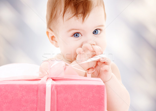 baby boy with gift box Stock photo © dolgachov