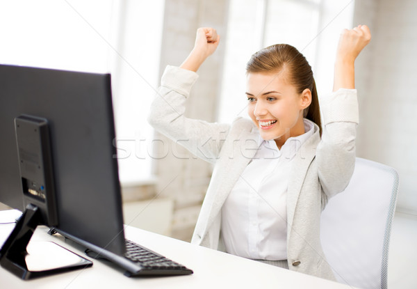 businesswoman with computer in office Stock photo © dolgachov