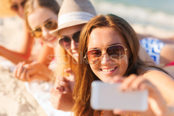 Foto stock: Sonriendo · mujeres · playa · vacaciones · de · verano