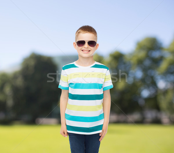 smiling cute little boy in sunglasses Stock photo © dolgachov