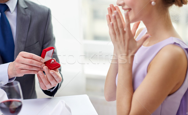 Excité jeune femme copain anneau couple amour [[stock_photo]] © dolgachov