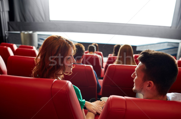 happy couple watching movie in theater or cinema Stock photo © dolgachov