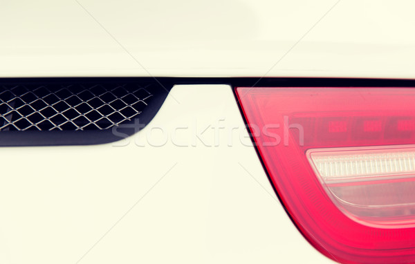 close up of car part with grille and headlight Stock photo © dolgachov