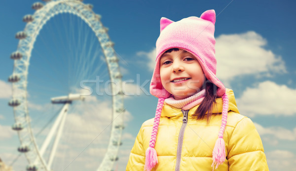 happy little girl over london ferry wheel Stock photo © dolgachov