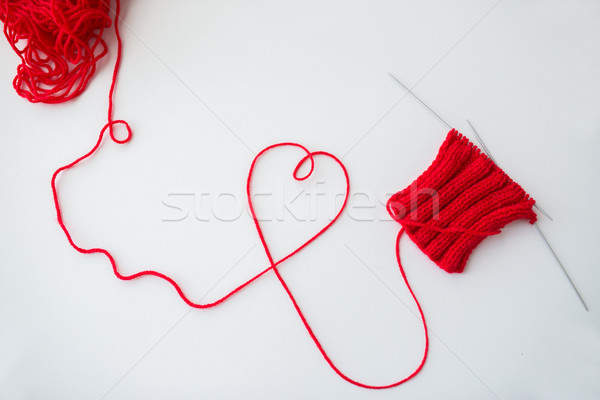 knitting needles and thread in heart shape Stock photo © dolgachov