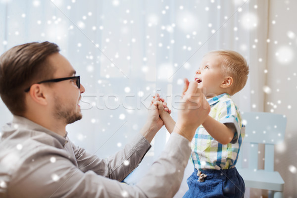 Stock photo: father with son playing and having fun at home