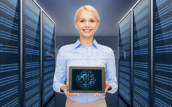 businesswoman with tablet pc over server room Stock photo © dolgachov