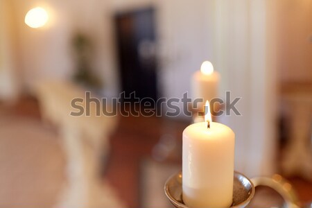 burning candles and coffin in church at funeral Stock photo © dolgachov