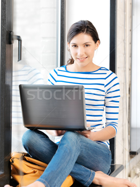 happy teenage girl with laptop computer Stock photo © dolgachov