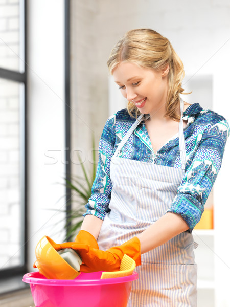 housewife washing dish at the kitchen Stock photo © dolgachov