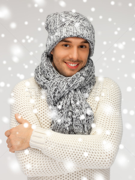 handsome man in warm sweater, hat and scarf Stock photo © dolgachov