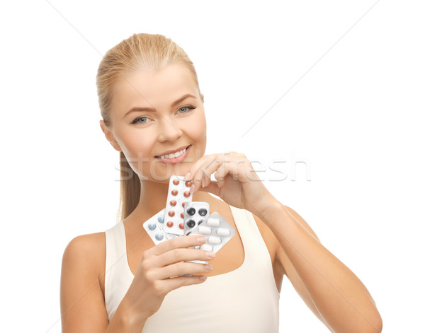 Jeune femme pilules photos variété femme santé [[stock_photo]] © dolgachov