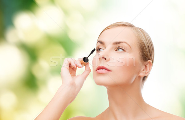 Mooie vrouw mascara cosmetica gezondheid schoonheid gelukkig Stockfoto © dolgachov