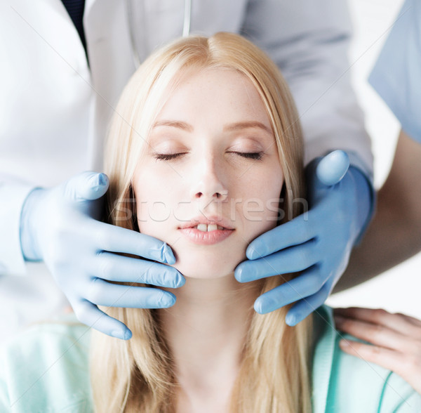 Stock photo: plastic surgeon or doctor with patient