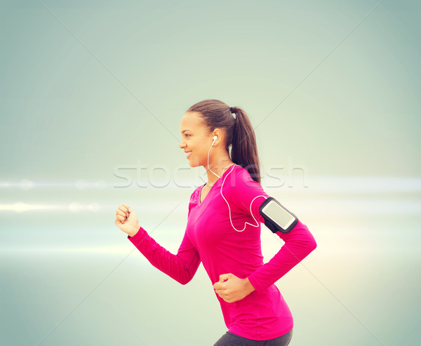 улыбаясь работает спорт фитнес здоровья Сток-фото © dolgachov