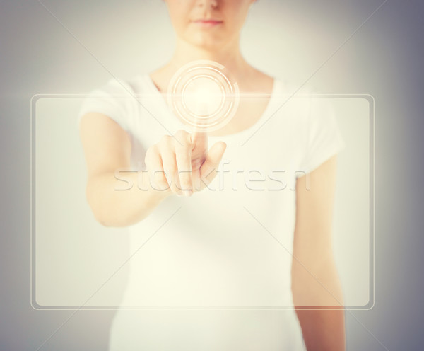 Kadın el dokunmak sanal ekran Stok fotoğraf © dolgachov