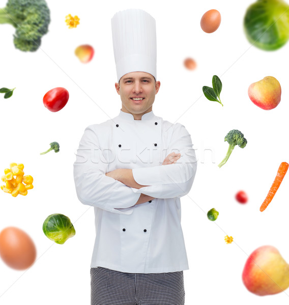 happy male chef cook with crossed hands Stock photo © dolgachov