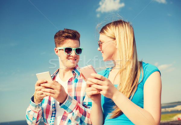 smiling couple having fun outdoors Stock photo © dolgachov