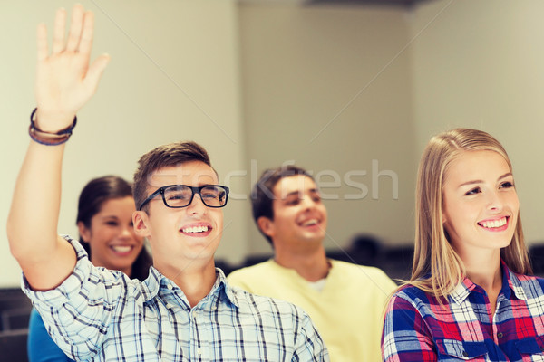 group of smiling students in lecture hall Stock photo © dolgachov