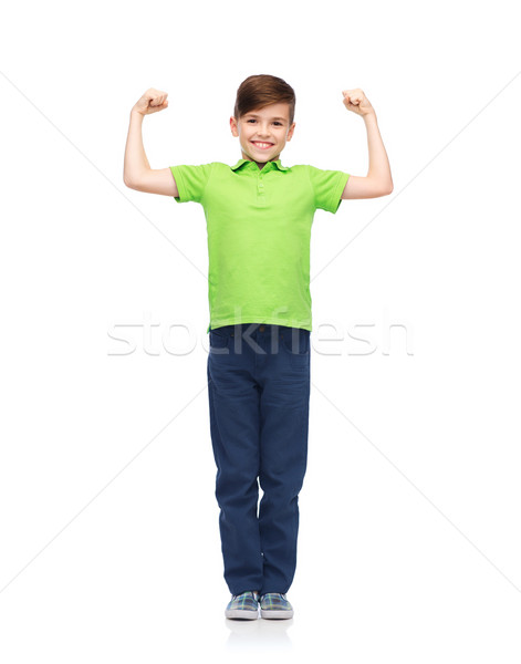 happy boy in polo t-shirt showing strong fists Stock photo © dolgachov