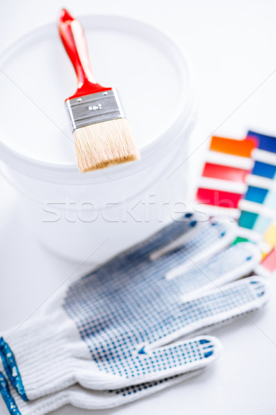 paintbrush, paint pot, gloves and pantone samples Stock photo © dolgachov