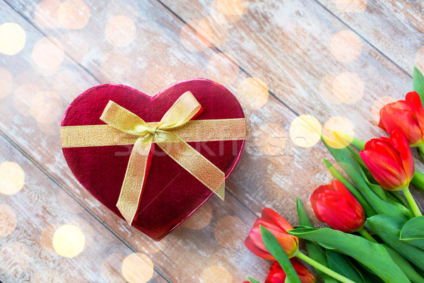 close up of red tulips and chocolate box Stock photo © dolgachov