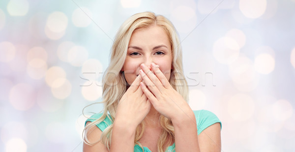 young woman or teenage girl closing her nose Stock photo © dolgachov