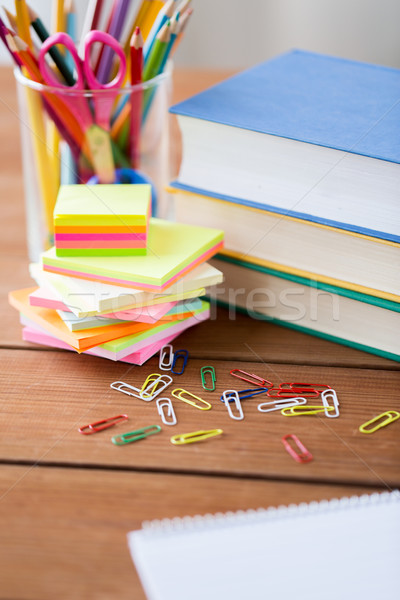 Stock photo: close up of pens, books, clips and stickers