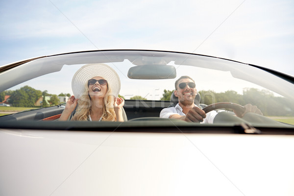 Heureux homme femme conduite cabriolet voiture Photo stock © dolgachov