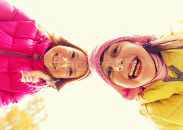 happy girls faces outdoors Stock photo © dolgachov