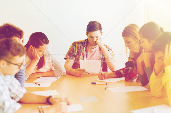 group of students with papers Stock photo © dolgachov