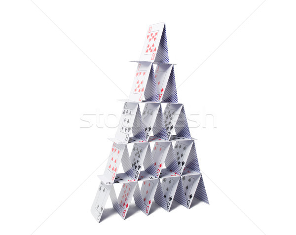 house of playing cards over white background Stock photo © dolgachov