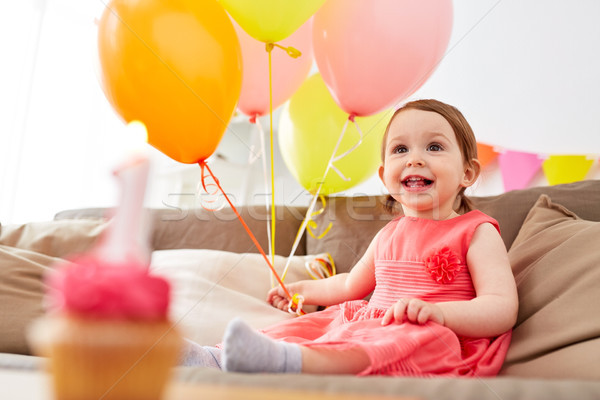 happy baby girl on birthday party at home Stock photo © dolgachov