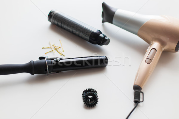 hairdryer, styler or curling iron and hair spray Stock photo © dolgachov