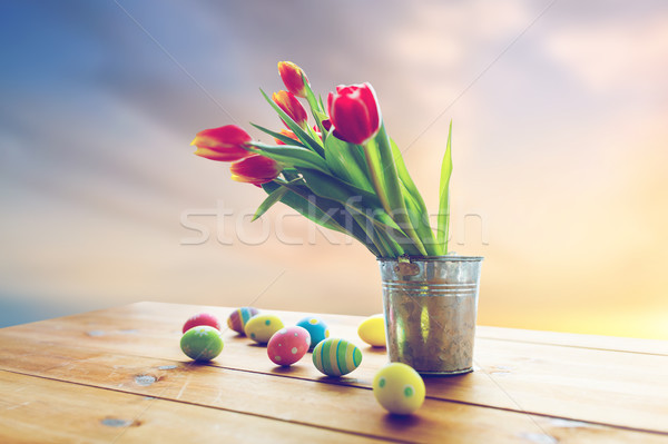 Paaseieren bloemen emmer Pasen religieuze vakantie Stockfoto © dolgachov