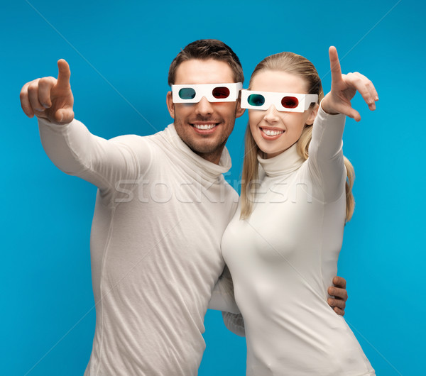 Człowiek kobieta okulary 3d wskazując palce para Zdjęcia stock © dolgachov