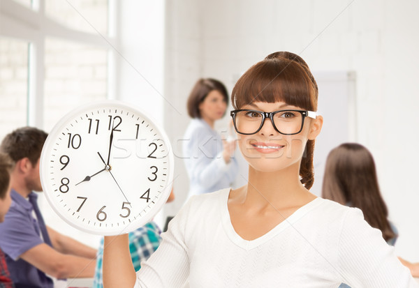 student showing clock Stock photo © dolgachov